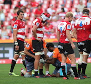 The Emirates Lions captain Warren Whiteley gets medical attention on the field after sustaining an injury to his knee during the Super Rugby match against the Blues at Ellis Park, Johannesburg on 10 March 2018.