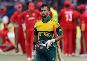 South African batsman JP Duminy leaves the pitch after loosing his wicket during the match between South Africa and Zimbabwe in the one day international tri-series which includes hosts Zimbabwe at the Harare Sports Club, on September 4, 2014 in Harare, Zimbabwe.
