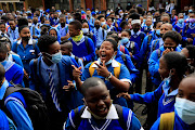 Tlhatlogang Junior Secondary School pupils react at morning assembly on January 12 2022.
