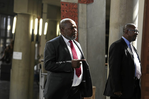 Former NPA head Mxolisi Nxasana enters the Constitutional Court in the Johannesburg, where the court ruled yesterday that the appointment of his successor Shaun Abrahams was unlawful.