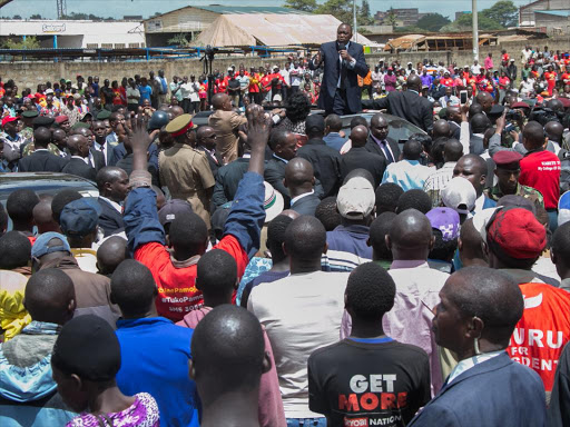 President Uhuru Kenyatta addresses residents of Thika after inaugurating the Volkswagen Production Line at Kenya Vehicle Manufacturers Limited in Thika on Wednesday. Photo/PSCU