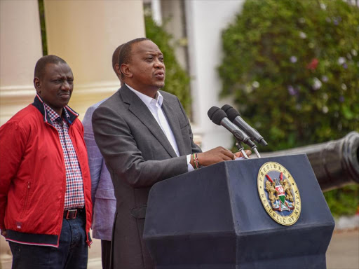 President Uhuru Kenyatta, DP William Ruto, Jubilee secretary general Raphael Tuju, and a party official during the press briefing on the cancelled JP primaries at State House, Nairobi, April 22, 2017. /PSCU