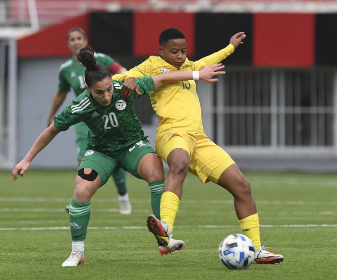 Banyana Banyana midfielder Refiloe Jane shields the ball from Algeria's Amira Braham during their AWCON qualifier in Algiers on Wednesday night.