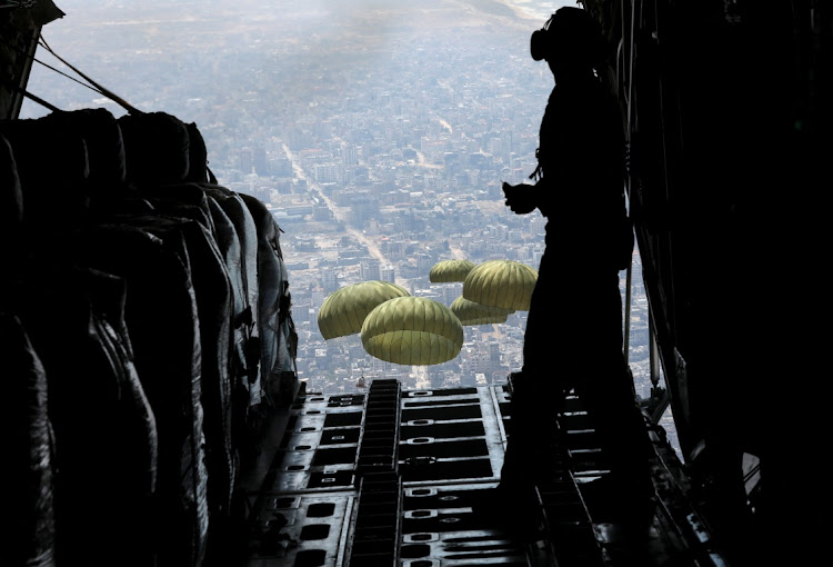 Members of Jordanian armed forces air drop aid parcels over Gaza, April 9, 2024. Picture: REUTERS/Alaa Al Sukhni