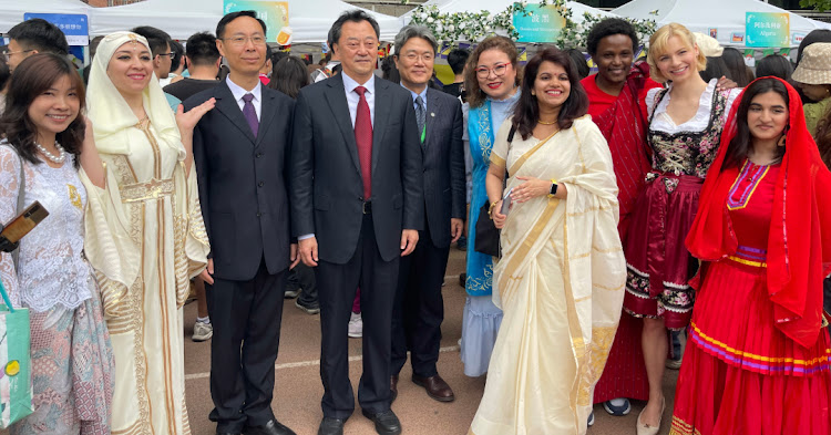 Secretary of the Party Committee of Beijing Language and Culture University Ni Haidong jjoins students at the 19th World Cultural Carnival in Beijing, China, on April 27, 2024
