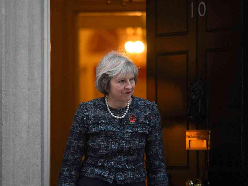 Britain's Prime Minister Theresa May waits to greet Hungary's Prime Minister Viktor Orban at Downing Street in London, Britain, November 9, 2016. REUTERS/Toby Melville