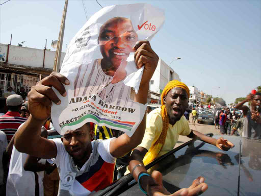 Supporters of president-elect Adama Barrow celebrate Barrow's election victory in Banjul, Gambia, December 2, 2016. /REUTERS