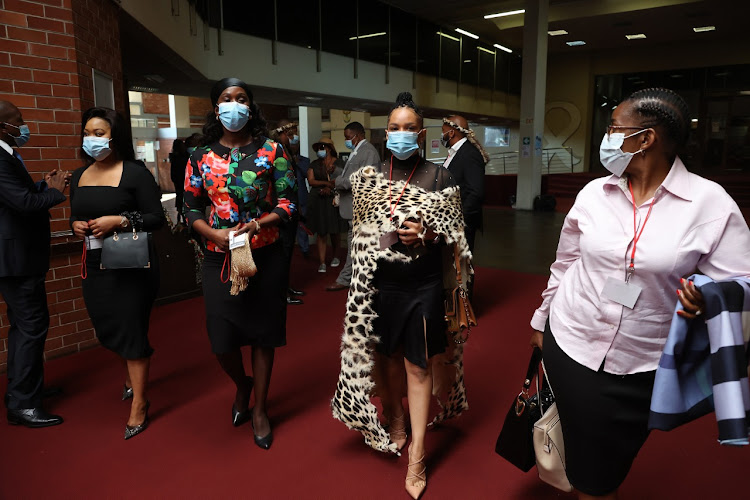 Prince Misuzulu's wife Nozizwe Mulela, floral top, attends the civil case matter involving the AmaZulu royal family at the Pietermaritzburg high court on Tuesday.