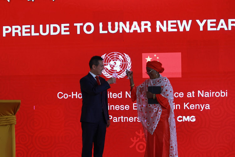 Chinese Ambassador Zhou Pingjian and Zainab Bangura, the director general at United Nations office in Nairobi, toast to the beginning of the Lunar New Year celebrations in Gigiri on January 31, 2024.