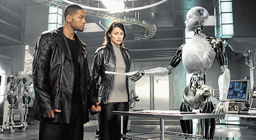 ROBO COP: Will Smith and Bridget Moynahan in 'I, Robot'. 2015 isn't 'beautifully mechanical but coldly, inscrutably digital'