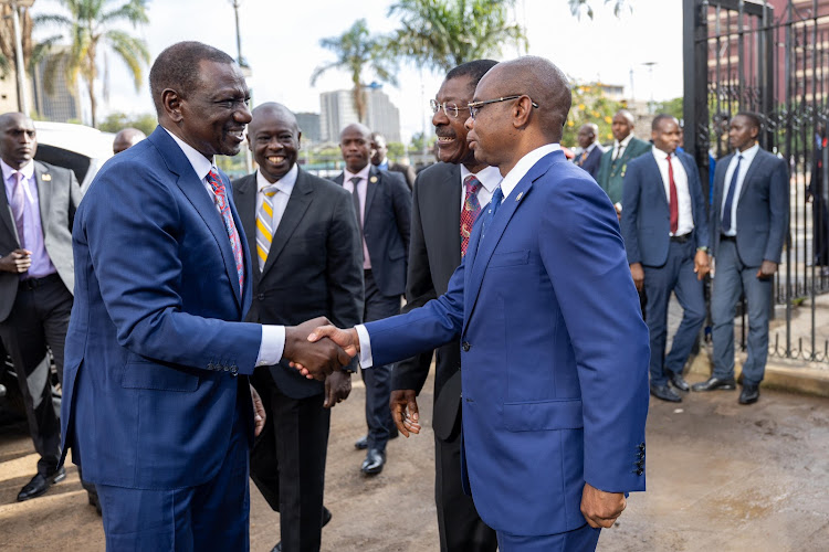 President William Ruto exchanges pleasantries with Senate Speaker Amason Kingi during the opening of the new Ultra-modern Bunge Tower on April 25, 2024.