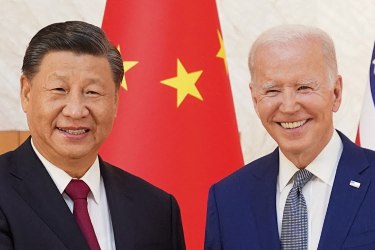 US President Joe Biden, right, shakes hands with Chinese President Xi Jinping as they meet on the sidelines of the G20 leaders' summit in Bali, Indonesia, on November 14 2022. Picture: REUTERS/KEVIN LAMARQUE