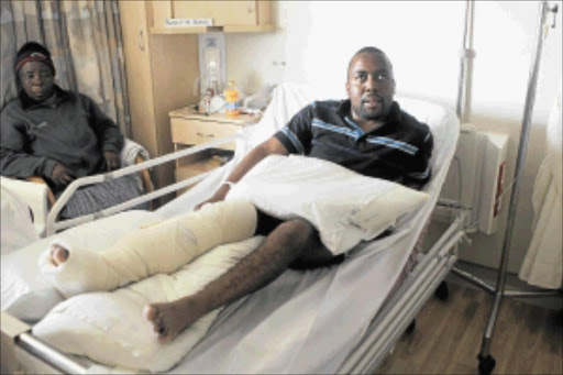 NOT DISCOURAGED: Thomas Malela, a blind Thabo Mbeki African Leadership Institute graduate could not attend his graduation ceremony because he injured his knee when he fell into a lift. Photo: PEGGY NKOMO