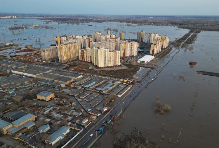 A drone view shows a flooded area around the Dubki residential complex in Orenburg, Russia, on Friday. Picture: REUTERS/STRINGER