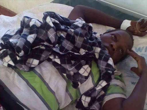 Talaa Kimakal, who was shot by Pokot bandits in Mochongoi, Baringo South subcounty, lies on her bed at Eldama Ravine Hospital, February 5, 2017. /JOSEPH KANGOGO