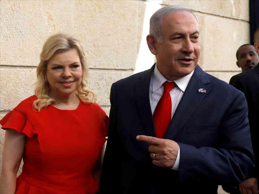 Sara and her husband, Israeli Prime Minister Benjamin Netanyahu, and his wife, stand next to the dedication plaque of the US embassy in Jerusalem, after the dedication ceremony of the new US embassy, May 14, 2018. /REUTERS