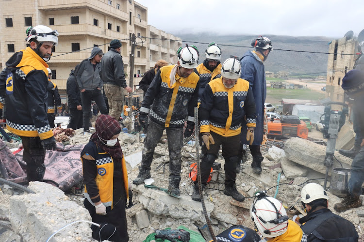 Salam Mahmoud, a volunteer at the Syria Civil Defence (White Helmets), takes part in the rescue operation following the earthquake, in Idlib province, Syria February 6, 2023.