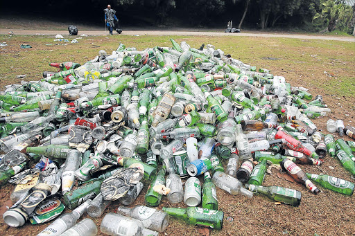 PAST HORRORS: Empty alcoholic drink bottles and cans piled up at Ebuhlanti after New Year celebrations Picture: ALAN EASON