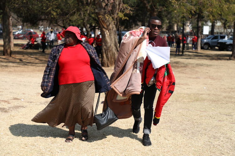 Student activist Bonginkosi Khanyile and his mother Phumzile Kathini on their way to the Union Buildings in Pretoria to stage a sleep out hoping to get a presidential pardon for his conviction on charges of damage to property during the fees must fall student protests.