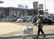 GROWTH: The new Protea Glen shopping centre in Soweto is the  sixth major mall in the  area and has   rival retailers  Pick n Pay and Shoprite  under one roof. 
      PHOTO: ANTONIO MUCHAVE
