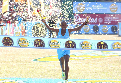 RELENTLESS RUN: Gift Kelehe wins the Comrades Marathon yesterday in Durban. The marathon is started at the City Hall, in Durban and finished in Pietermaritzburg. It was the first time local athletes clinched the number one spots since 1992 GALLO IMAGES