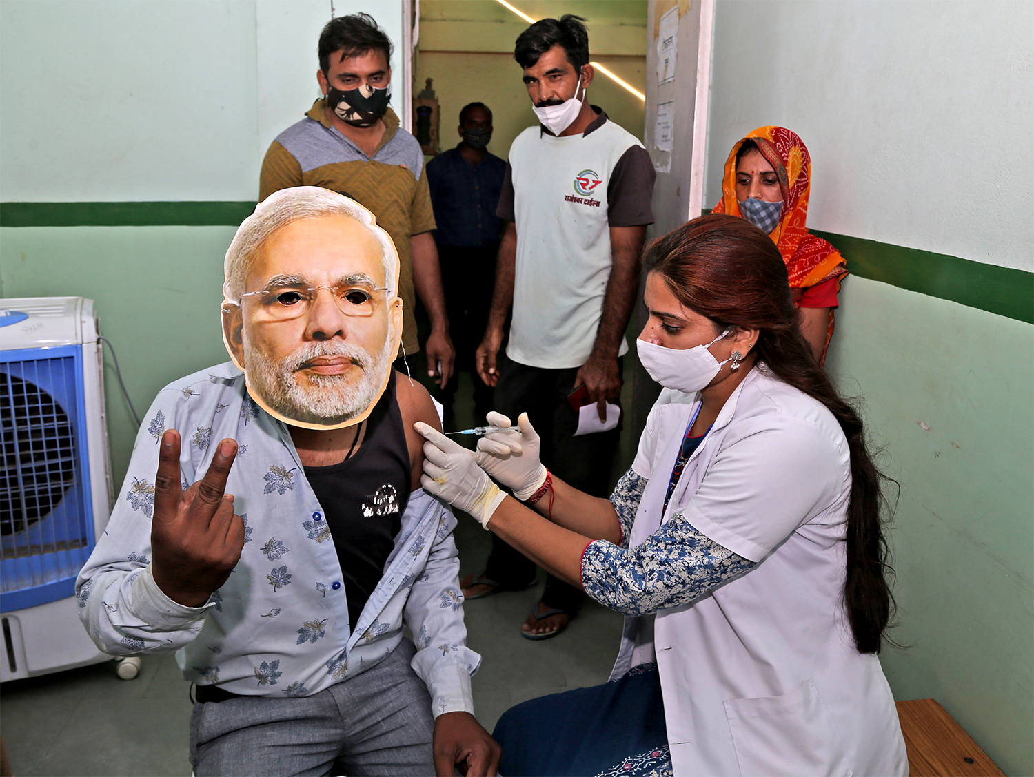 Record vaccinations on Modi’s birthday include false certificates, point to coerced numbers