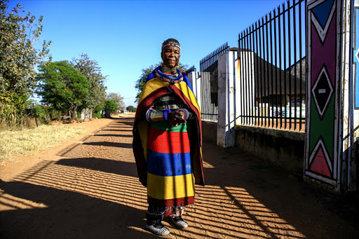 Esther Mahlangu outside of her home in Mabhoko, Mpumalanga