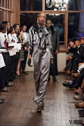 David Tlale showed a metallic-coloured range in silky fabrics teamed with silver stoles and feathered corsets.