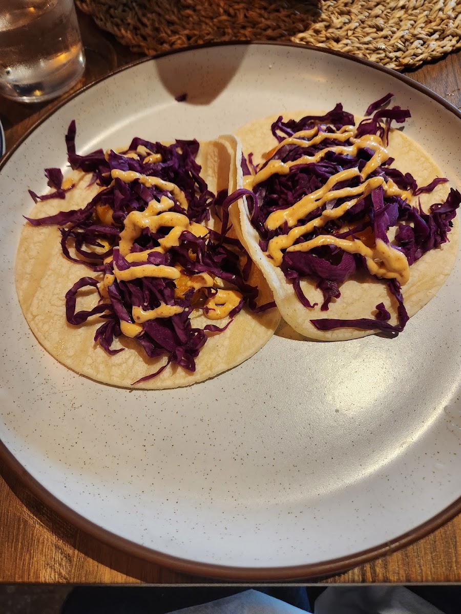 Shrimp tacos. The shrimp are there under the cabbage.