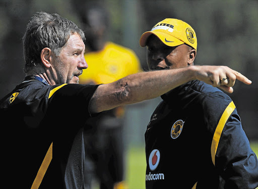 Kaizer Chiefs' head coach Stuart Baxter discusses match tactics with his assistant, Doctor Khumalo, during the Kaizer Chiefs media open day at The Village, Naturena, in September
