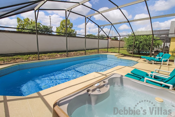 Hot tub and private south-facing pool at this Kissimmee villa