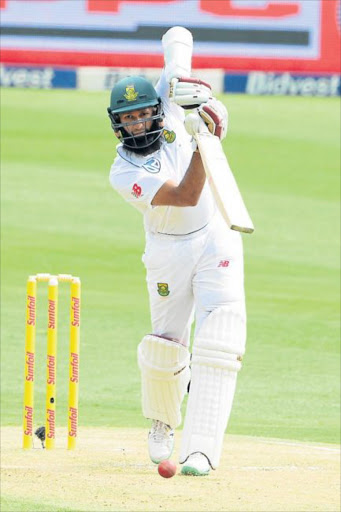 MASTER CLASS: Hashim Amla slammed a century, his first score past the 50 mark in 14 trips to the crease, to help steer the Proteas to a commanding position in the third and final Test against Sri Lanka yesterday Picture: GALLO IMAGES