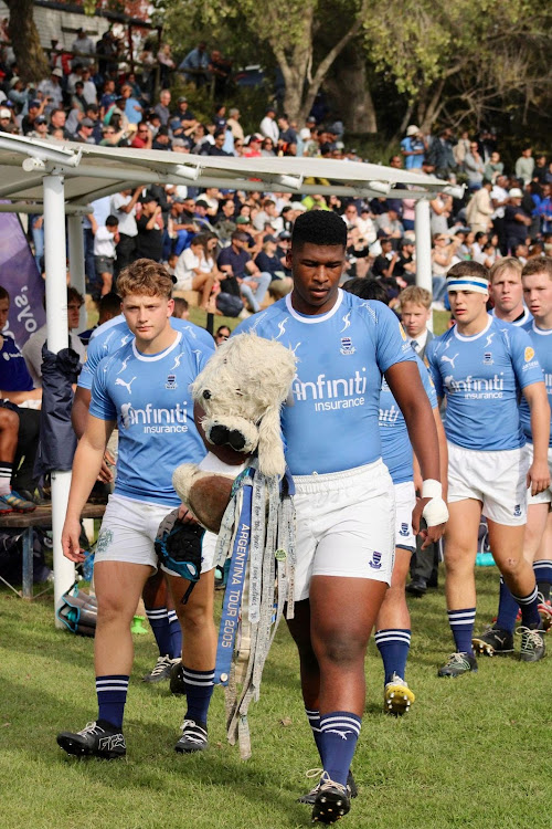 Likhona Sodlaka, right, and Jon Hobson lead out the Grey High first team for their clash at the weekend against Wynberg in Cape Town, which ended in a 10-10 draw. Both players will be in action at the annual Grey High Rugby Festival in Gqeberha on May 2 and 4.