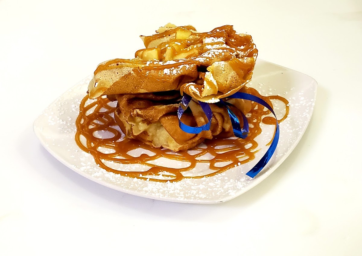 Crepe Aumoniére : French Vanilla Custard, Apple cooked with Honey and House Made Salted Butter Caramel.