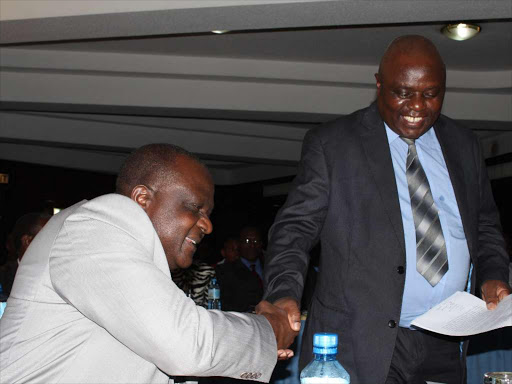 National Drought Management Authority CEO James Oduor and Kenya Meteorological department acting director Peter Ambenje during the release of the weather outlook for October- December at a Nairobi hotel yesterday /COLLINS KWEYU