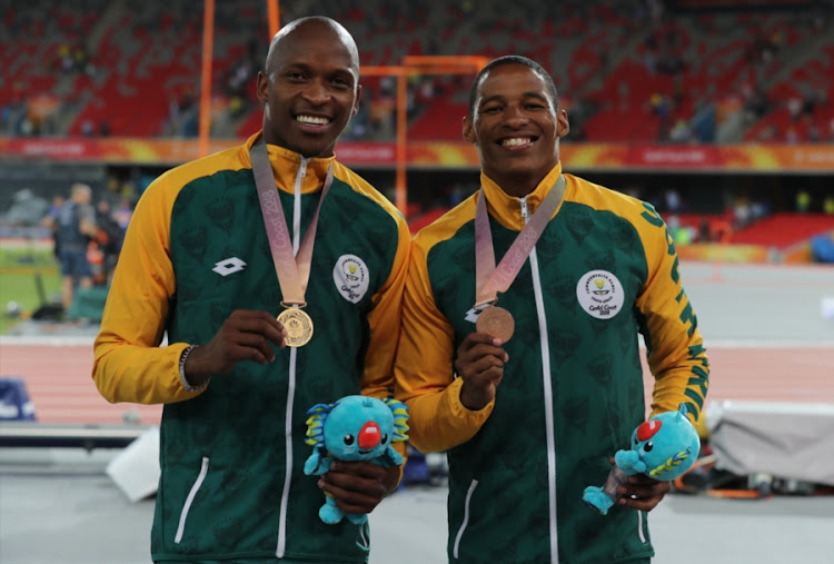 Luvo Manyonga and Ruswahl Samaai of South Africa during the Medal Ceremony of the Men's Long Jump Final on day 7 of the Gold Coast 2018 Commonwealth Games at Carrara Stadium Track on April 11, 2018 in Gold Coast, Australia. Manyonga won gold while Sammai bagged bronze.