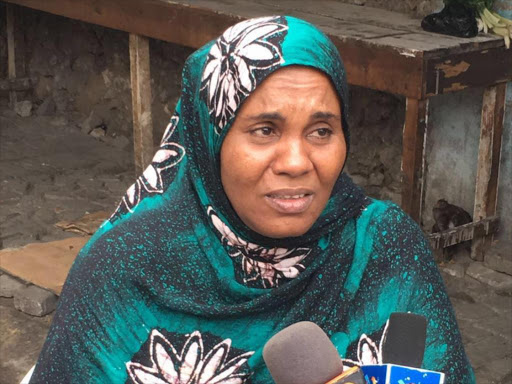 Nadiya Ahmed, the mother of slain terror suspect Ismael Shosi, addresses the media shortly after his burial in Mombasa, September 28, 2016 /ELKANA JACOB