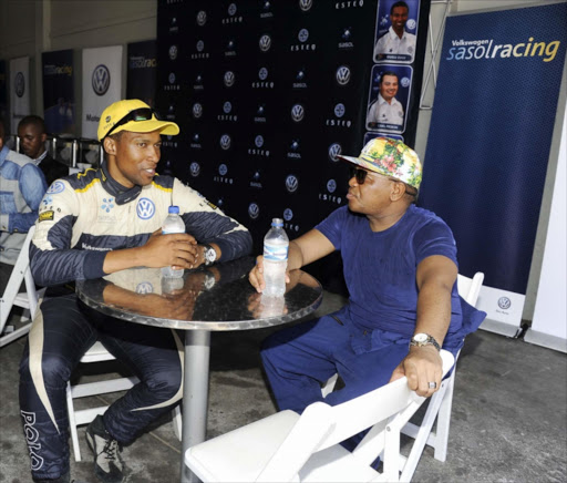 A file photo of Gugu Zulu with the Minister of Sport and Recreation Fikile Mbalula at the annual Volkswagen Rally Day at Zwartkops Raceway on November 25, 2014 in Pretoria.