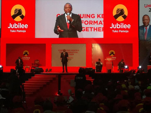 President Uhuru Kenyatta addressing Jubilee supporters in the Kasarani indoor arena during the party official launch of the manifesto ahead of August poll. Photo/COURTESY