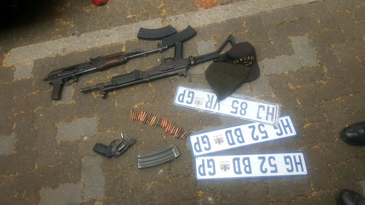 Weapons found in an abandoned car which police believe may be linked to cash-in-transit heists.