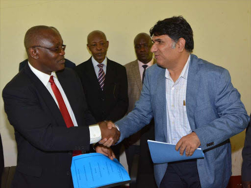 SWEET DEAL: Kisii Governor James Ongwae and Kanoria Group CFO Vinod Vohra in Kisii town on Tuesday.