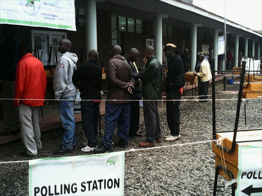 Voters queue at a past by-election in Mathare constituency. /FILE