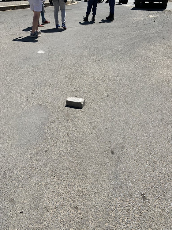 A brick allegedly thrown at bikers, farmers and community members in Senekal by EFF supporters.