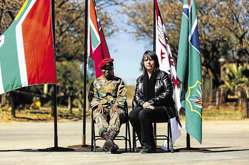 WOMEN AT WAR: Operations medic Corporal Molatelo Nkoana, left, and accounting clerk Susette Gates, received medals in Bloemfontein for going beyond the call of duty in the Battle of Bangui last year