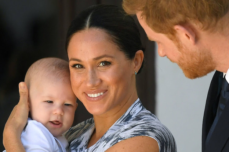 Britain's Prince Harry and his wife Meghan, Duchess of Sussex, holding their son Archie