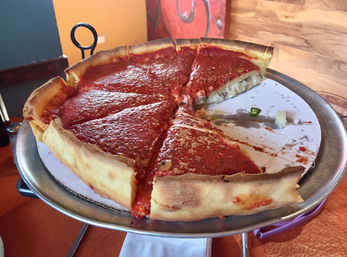 Stuffed deep dish supreme pizza