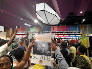 Protesters storm the book launch of 'Gangster State' at Exclusive Books in Sandton, in defence of Ace Magashule, who is the main actor in the book unravelling  state capture in the Free State.  /NEO GOBA