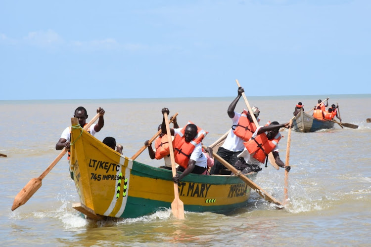 Fisherfolk take part in boat racing to mark World Fisheries Day in Eliye, Lake Turkana