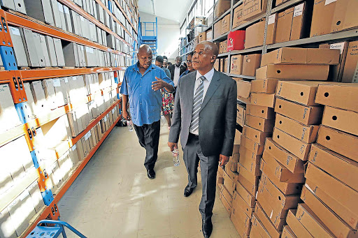 CRISIS: Premier Phumulo Masualle and education MEC Mandla Makupula assess the record management centre at the Eastern Cape education department office in Zwelitsha Picture: MARK ANDREWS
