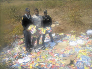 CRIME SCENE: 
       These books were found at a dumping site at Majeje village, near Phalaborwa. 
      PHOTO: SUPPLIED